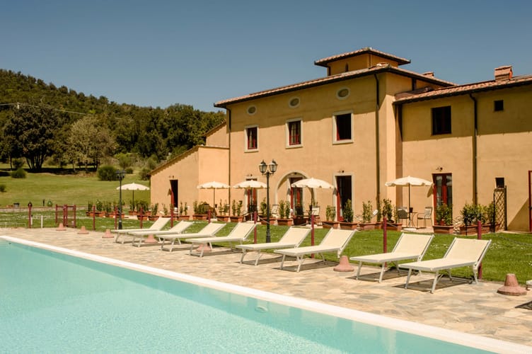 Outdoor swimming pool at Casolare Terre Rosse